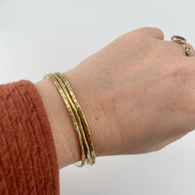 Load image into Gallery viewer, These bangles have a heavy hammer texture.
